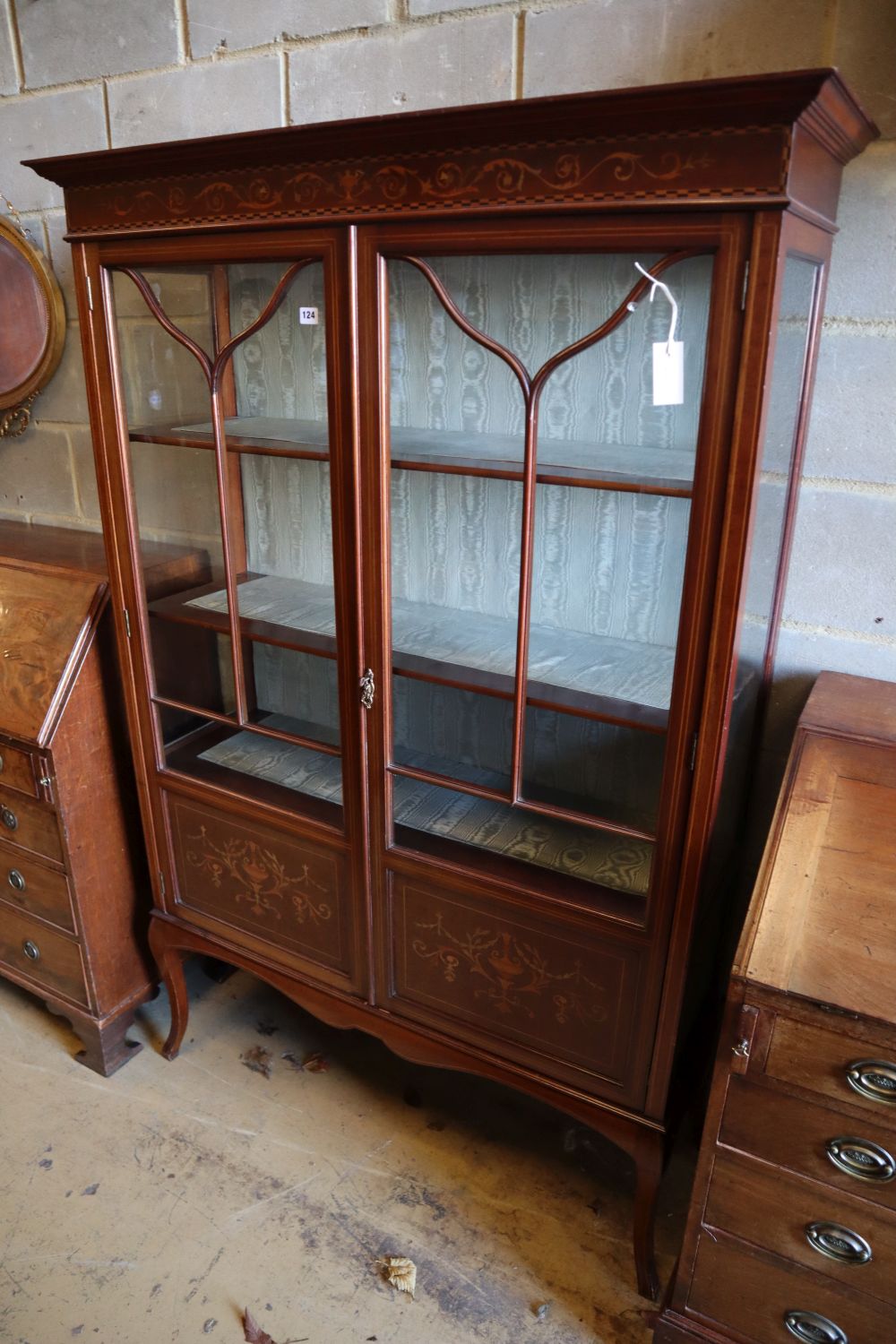 An Edwardian satinwood-inlaid mahogany display cabinet, width 121cm